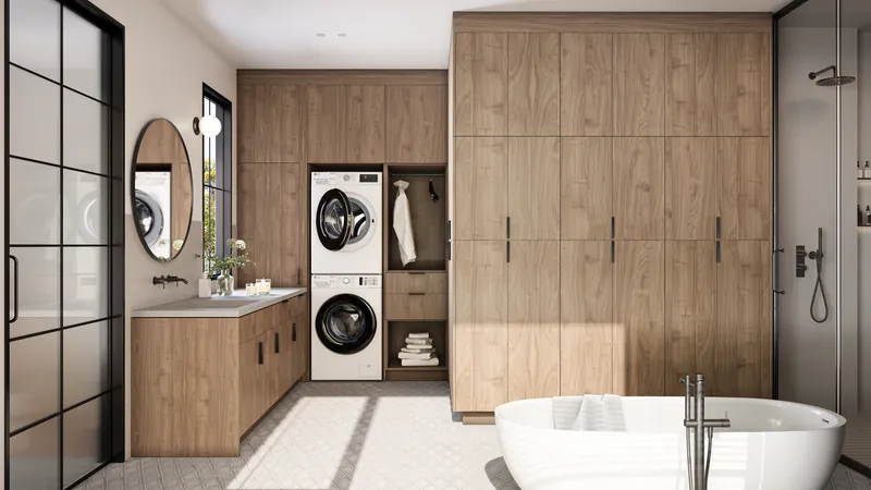 Bath and laundry room with wood slab cabinets, a stacked washer and dryer and a freestanding tub
