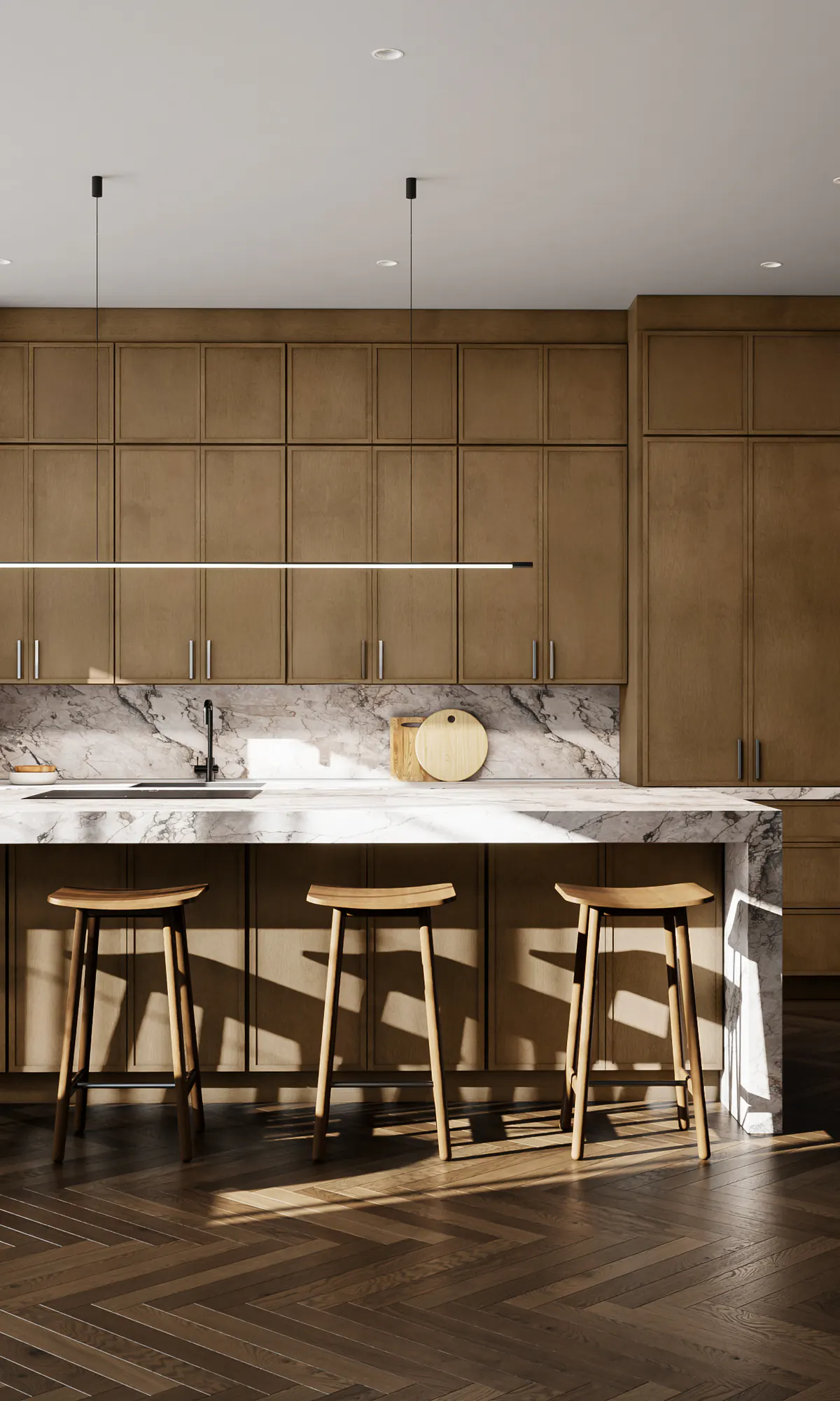 Open kitchen with warm wood slim-shaker cabinets and a dark island with wood stools